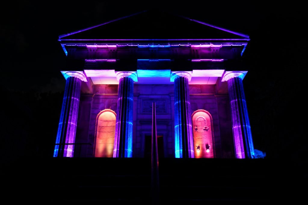 Samuel Worth Chapel lit up blue and purple at night, Sheffield